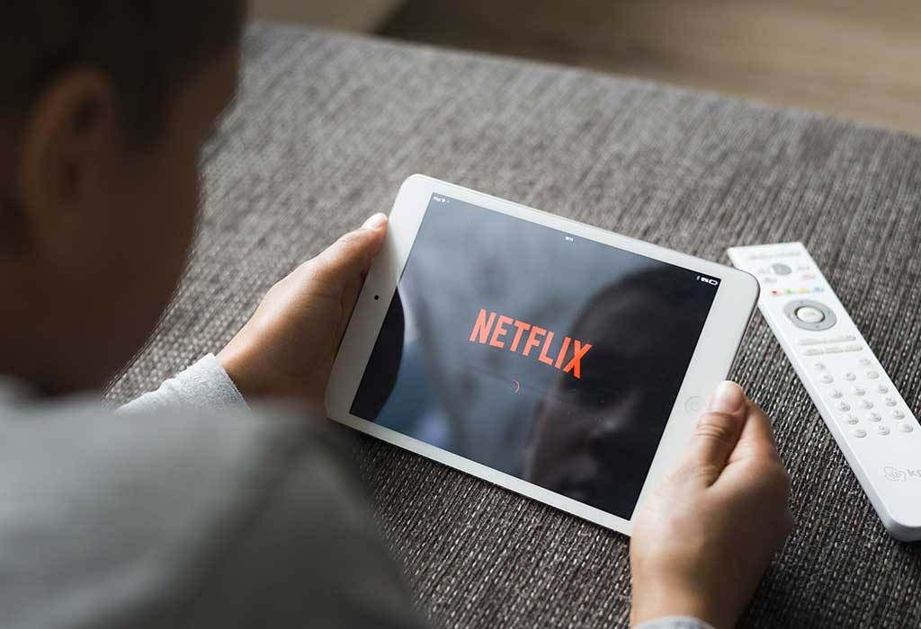 kid watching Netflix on a tablet